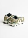 The W XT Whisper Embroidery Deep Lichen Green, Eucalyptus and Butterfly from Salomon at Couverture and The Garbstore back