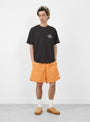 The Water Short Stock from Stüssy comes in Apricot at Couverture & The Garbstore
model front 