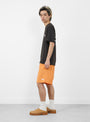 The Water Short Stock from Stüssy comes in Apricot at Couverture & The Garbstore
model side