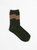 Wind Flag Socks Moss Green from Minä Perhonen at Couverture & The Garbstore
front 