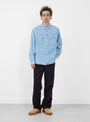 The Work Shirt from Stüssy comes in Light Denim at Couverture & The Garbstore
model front 