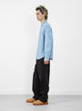 The Work Shirt from Stüssy comes in Light Denim at Couverture & The Garbstore
model side