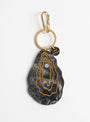 Hand Painted Oyster Bag Charm from Solar Eclipse at Couverture & The Garbstore
front