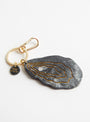 Hand Painted Oyster Bag Charm from Solar Eclipse at Couverture & The Garbstore
detail