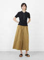 The Collared Short Sleeve T-Shirt from 7115 by Szeki comes in Speckle Black at Couverture & The Garbstore
model front 