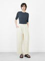 The Spring Pleated Trouser from 7115 by Szeki comes in Off White from Couverture & The Garbstore
model front