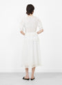 The Sofia Embroidery Puff Sleeve Dress from Sea comes in White at Couverture & The Garbstore
model back 