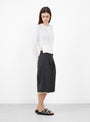 The Appointment Cardigan from mfpen comes in Ecru at Couverture & The Garbstore
model side