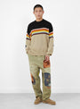 The 5G Cotton Knit Peckish Rainbowy Crew Sweater from Kapital comes in Black at Couverture & The Garbstore
model front 