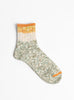 The Six Colour Twister & Slab Nep Socks Orange from Mauna Kea at Couverture and The Garbstore
front