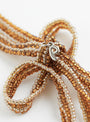 Bow Bolo Necklace BrownBrownPura Utz (back view) at Couverture & The Garbstore