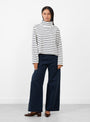 Nessa-T-Neck-Blouse-Ecru-and-Navy-Stripe-Ecru-and-Navy-Stripe-SKALL-Model_Front_View at Couverture & The Garbstore