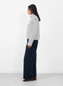 Nessa-T-Neck-Blouse-Ecru-and-Navy-Stripe-Ecru-and-Navy-Stripe-SKALL-Model_Side_View at Couverture & The Garbstore