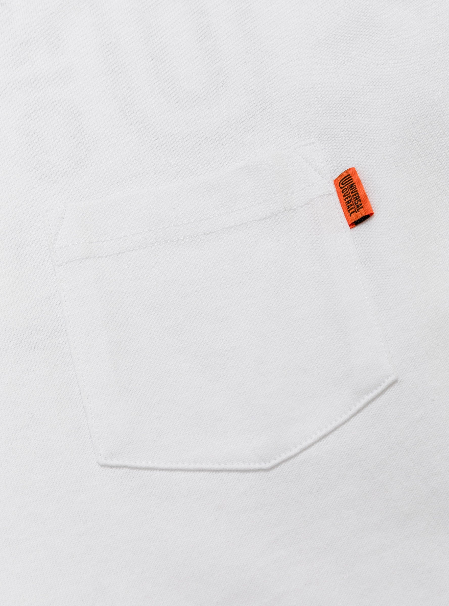 UO Back Logo LS Tee White UNIVERSAL OVERALL (pocket) at Couverture & The Garbstore