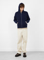 Waffle Cashmere Zip Hoodie Deep Navy Stussy (model front) at Couverture & The Garbstore