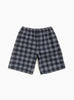 The Plaid Beach Short from Stüssy comes in Black at Couverture & The Garbstore 
front